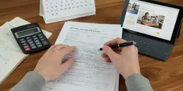 Person filling out Social Security forms for 2026 benefits